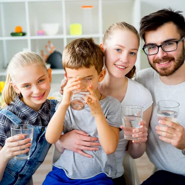 Parents and Children Drinking Water