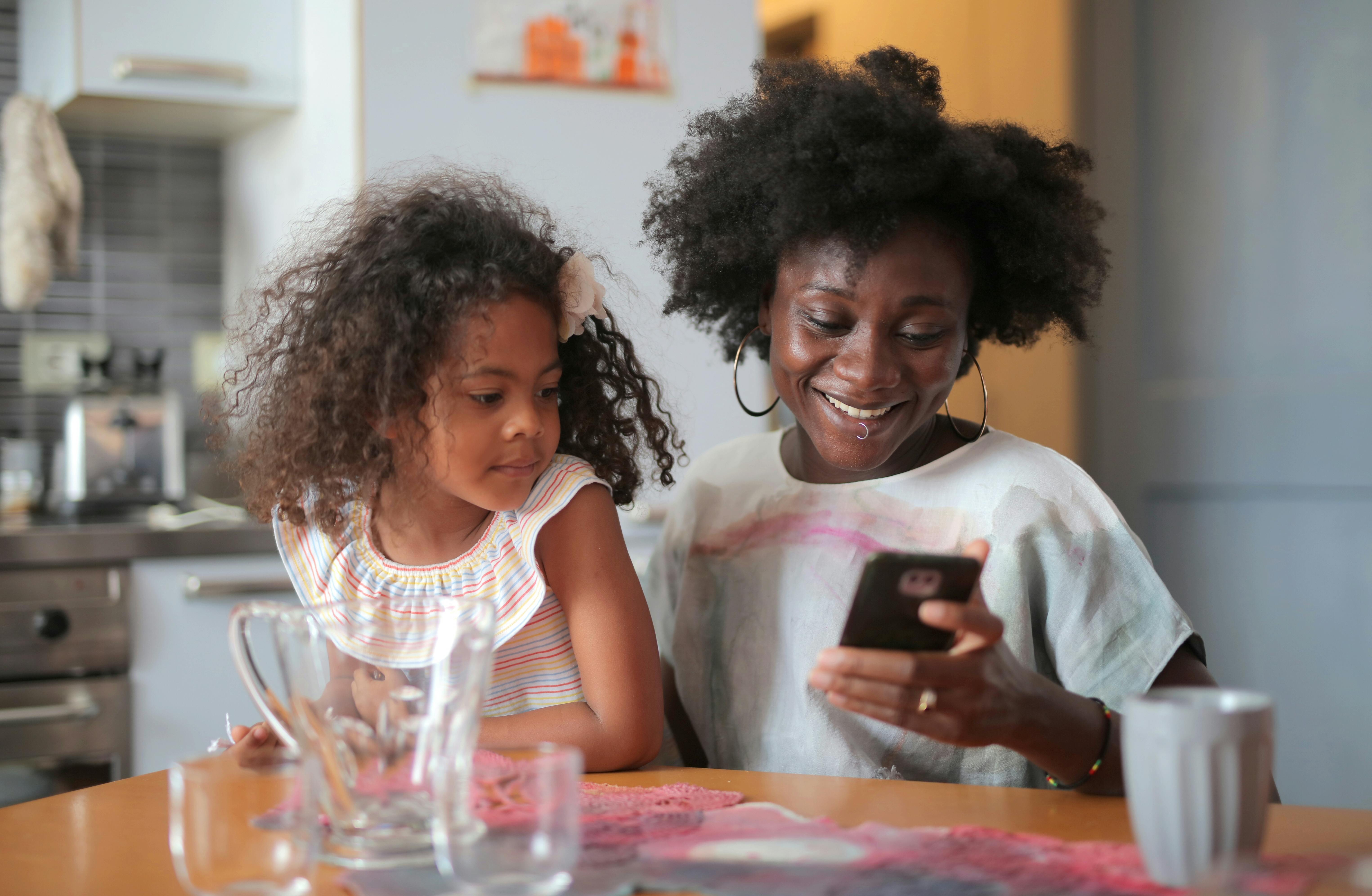 Mom at table with daughter