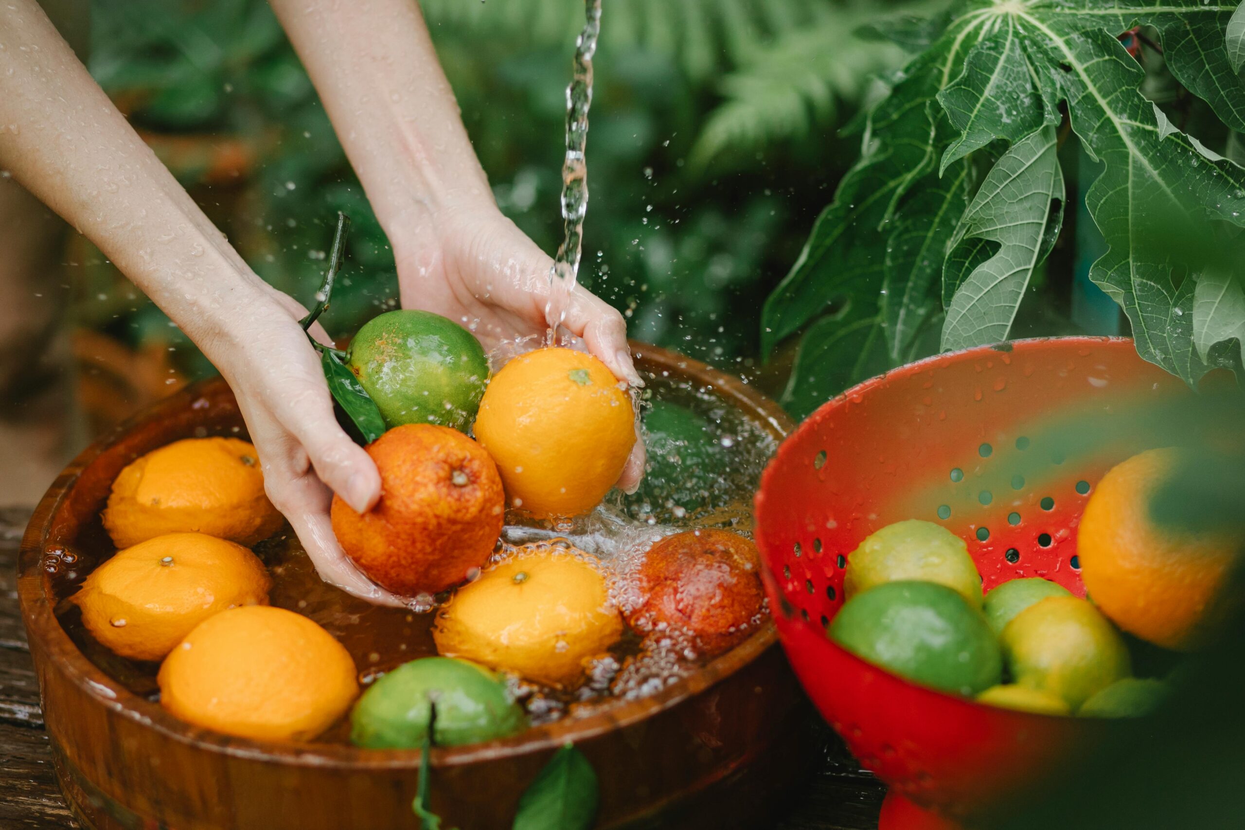 Woman Rinsing Fruits