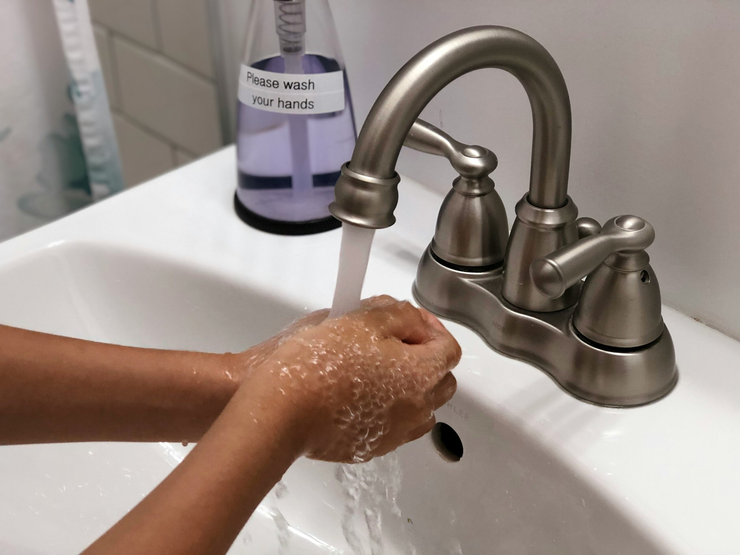 Woman washing hands