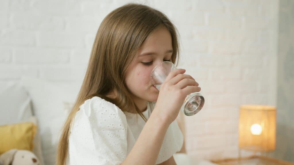 Young Girl Drinking Water